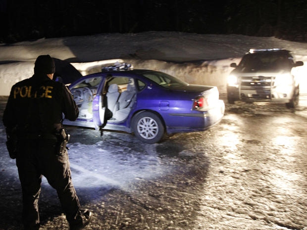 Police examine a car at Mount Rainier National Park 
