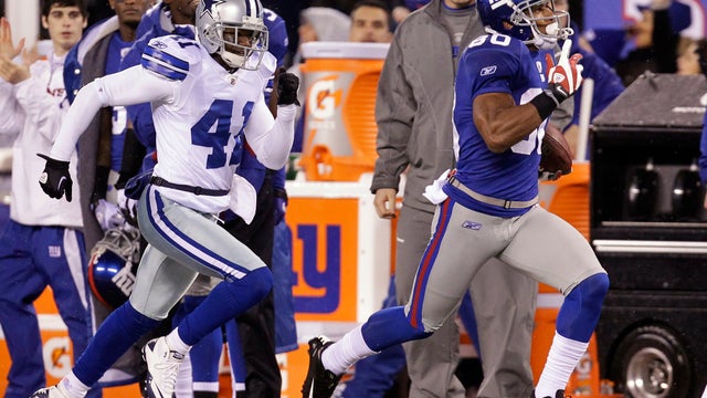 Terence Newman chases Victor Cruz  