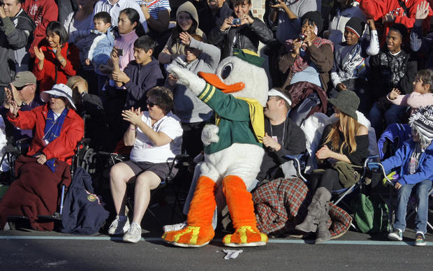 The University of Oregon Duck mascot joins paradegoers on the street in the   123rd Rose Parade in Pasadena, Calif., Monday, Jan. 2, 2012. 