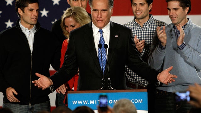 Republican presidential candidate, former Massachusetts Gov. Mitt Romney addresses supports with his family behind him during a Romney for President Iowa Caucus night rally in Des Moines, Iowa, Tuesday, Jan. 3, 2012.  
