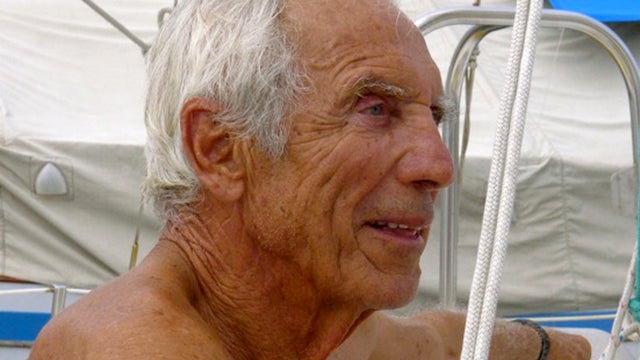 U.S. sailor Thomas Louis Corogin is pictured near a boat in the Panama Canal Zone in this November 2010 photo released by Jack Majszak. The 84-year-old American was making his seventh attempt to sail alone around the tip of South America before he was fou 