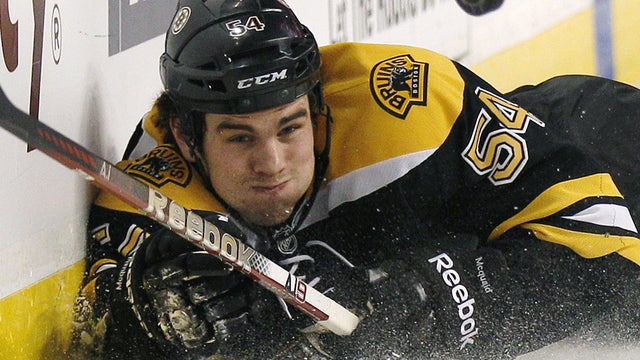 Adam McQuaid tries to center the puck 