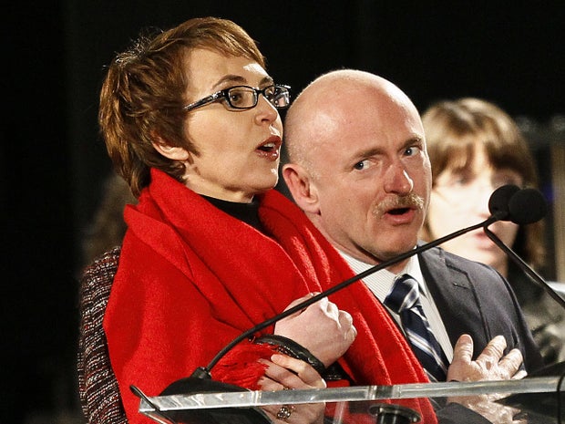 Giffords mulling re-election bid: husband 