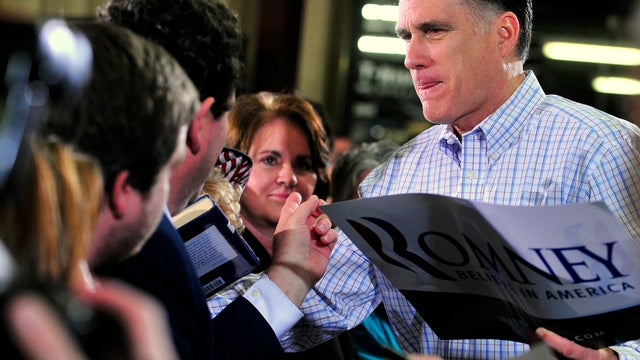 Former Massachusetts Gov. Mitt Romney meets supporters at Cherokee Trike and More in Greer, S.C., Jan. 12, 2012. 