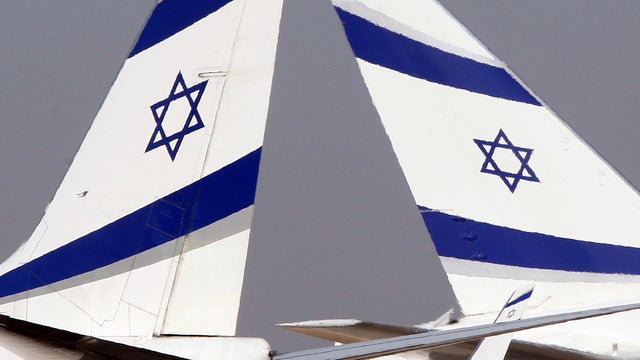 A Boeing 777-200, right, and a Boeing 737-800 of El Al Israel Airlines sit at the tarmac at Ben Gurion International Airport in Israel Oct. 28, 2009. 