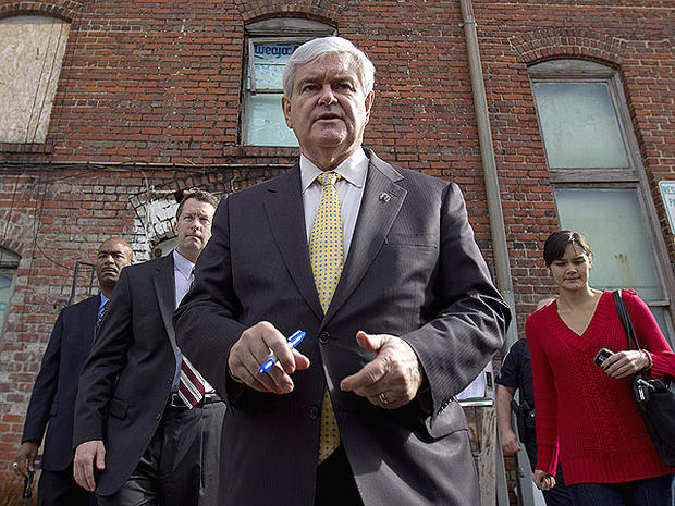 Republican presidential candidate, former House Speaker Newt Gingrich greets supporters following a campaign town hall meeting at the Art Trail Gallery, Jan. 17, 2012, in Florence, S.C. 