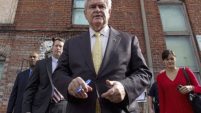 Republican presidential candidate, former House Speaker Newt Gingrich greets supporters following a campaign town hall meeting at the Art Trail Gallery, Jan. 17, 2012, in Florence, S.C. 