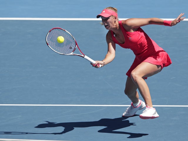 Caroline Wozniacki reaches for a shot 