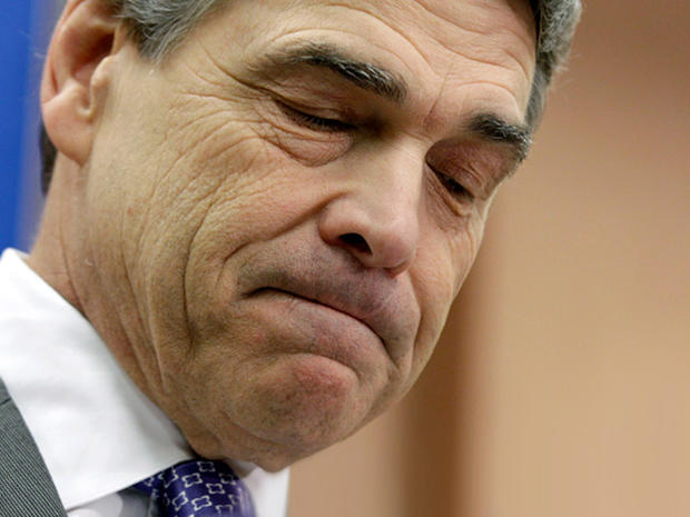 Republican presidential candidate, Texas Gov. Rick Perry pauses while announcing he is suspending his campaign and endorsing Newt Gingrich, Thursday, Jan. 19, 2012, in North Charleston, S.C. 