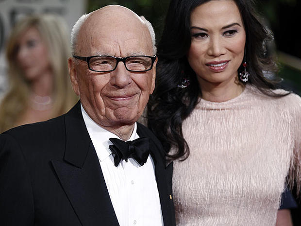 Rupert Murdoch and his wife Wendi arrive at the 69th Annual Golden Globe Awards, Jan. 15, 2012, in Los Angeles.  