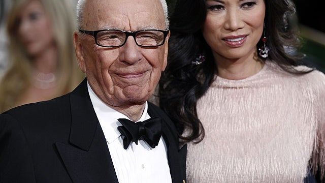 Rupert Murdoch and his wife Wendi arrive at the 69th Annual Golden Globe Awards, Jan. 15, 2012, in Los Angeles.  