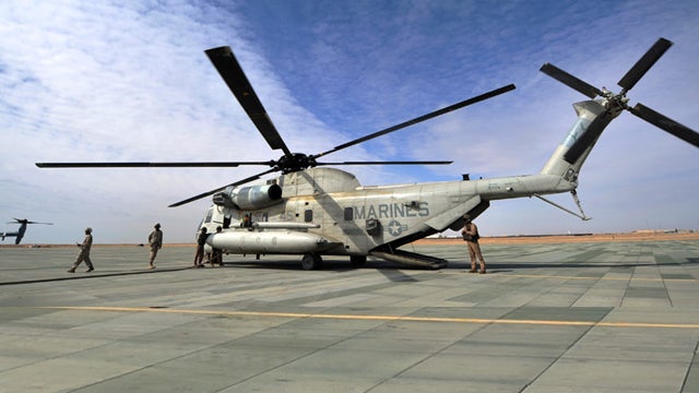 US Marines refuel a CH-53 helicopter at camp Dwyer, Gamser in Helmand Province on February 16, 2011. There are around 140,000 foreign troops in Afghanistan fighting the Taliban, who were ousted from power by a US-led invasion in 2001 following the Septemb 