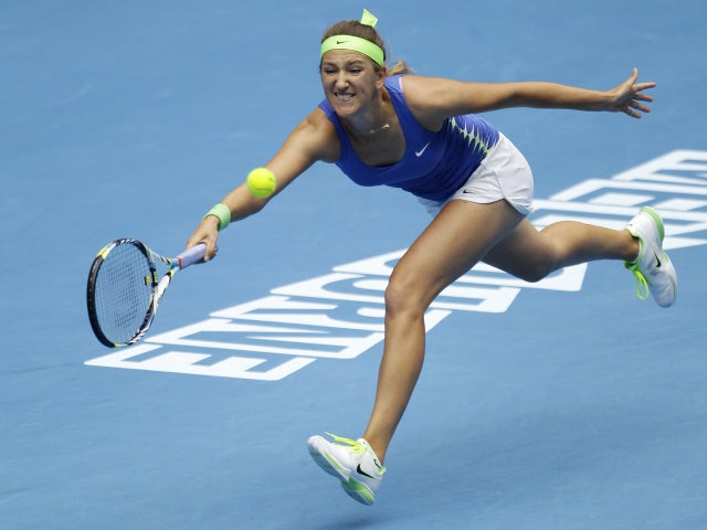 Victoria Azarenka reaches for a forehand return 