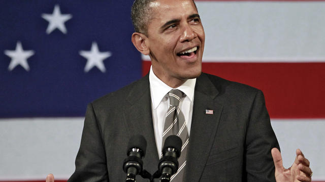 President Barack Obama sings before speaking 