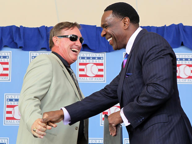 Andre Dawson has a laugh with fellow Hall of Fame member Gary Carter  