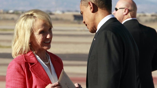 President Obama talks with Arizona Gov. Jan Brewer 
