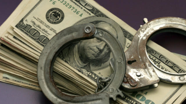 money-and-handcuffs-istock.jpg 