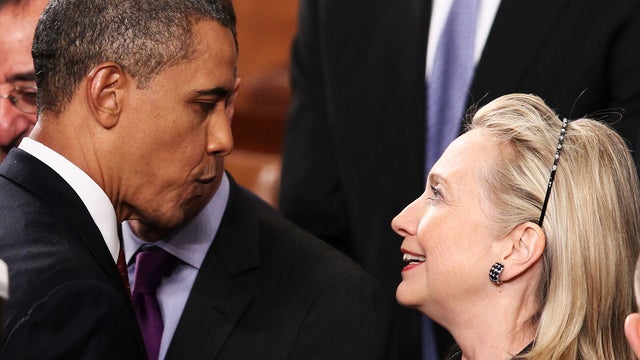 U.S. President Barack Obama greets Secretary of State Hillary Rodham Clinton  