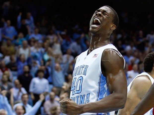 Harrison Barnes reacts following a dunk  