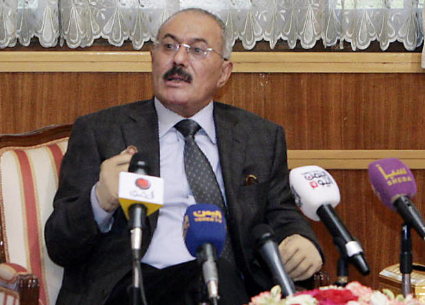 Outgoing Yemeni President Ali Abdullah Saleh speaks to the press at the presidential palace in Sanaa 