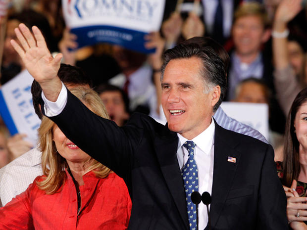 Republican presidential candidate, former Massachusetts Gov. Mitt Romney waves during his victory celebration after winning the Florida primary election Tuesday Jan. 31, 2012, in Tampa, Fla. 