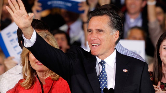 Republican presidential candidate, former Massachusetts Gov. Mitt Romney waves during his victory celebration after winning the Florida primary election Tuesday Jan. 31, 2012, in Tampa, Fla. 