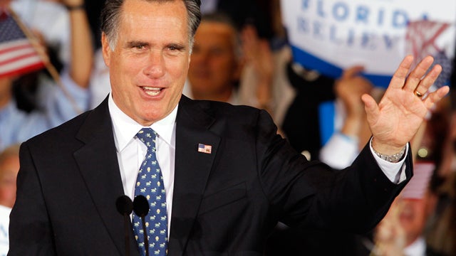 Republican presidential candidate, former Massachusetts Gov. Mitt Romney waves to supporters during his victory celebration after winning the Florida primary election Tuesday Jan. 31, 2012, in Tampa, Fla. 