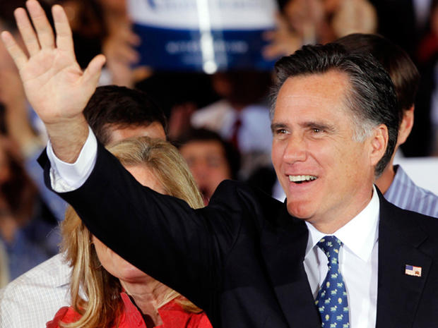 Republican presidential candidate, former Massachusetts Gov. Mitt Romney waves to supporters during his victory celebration after winning the Florida primary election Tuesday Jan. 31, 2012, in Tampa, Fla 