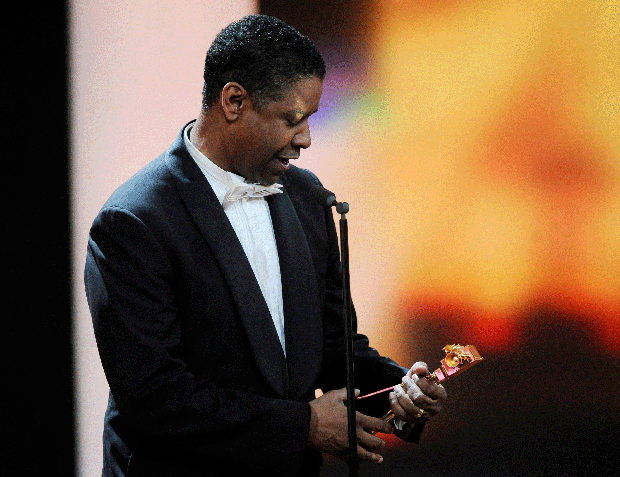 Actor Denzel Washington holds his trophy for  Best International Actor during the 47th Golden Camera award ceremony in Berlin on  Feb 4, 2012.  