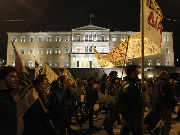 Protesters rally against austerity measures in front of the Greek Parliament 
