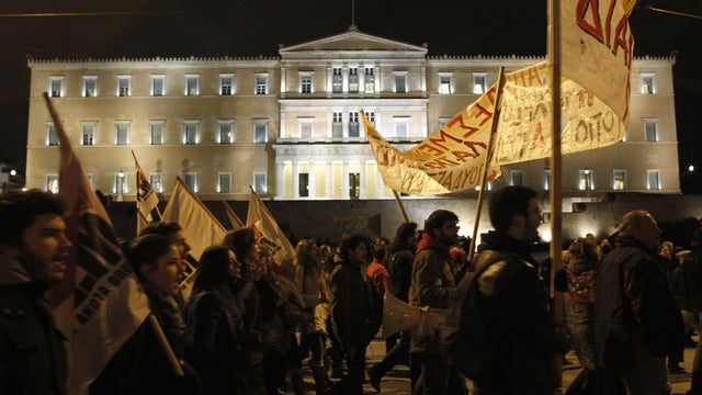 Protesters rally against austerity measures in front of the Greek Parliament 
