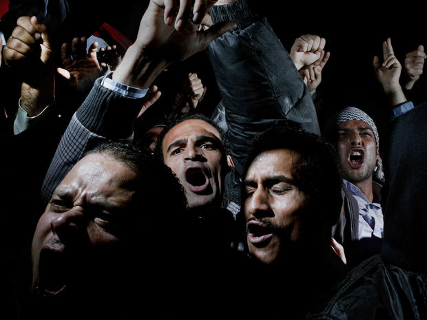 protesters cry, chant and scream in Cairo's Tahrir Square 
