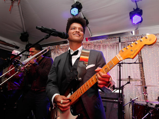Musician Bruno Mars performs during the Warner Music Group Grammy Celebration hosted by InStyle 