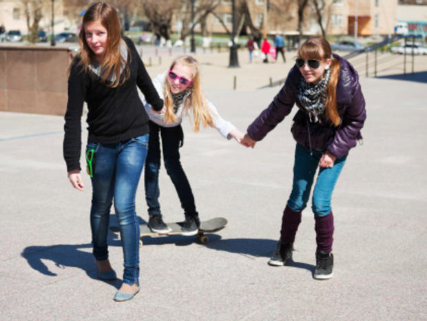Teenage girls with skateboard 