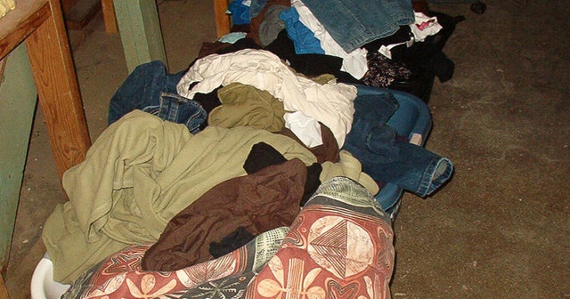 Police: Texas man found in pile of laundry, arrested - CBS News