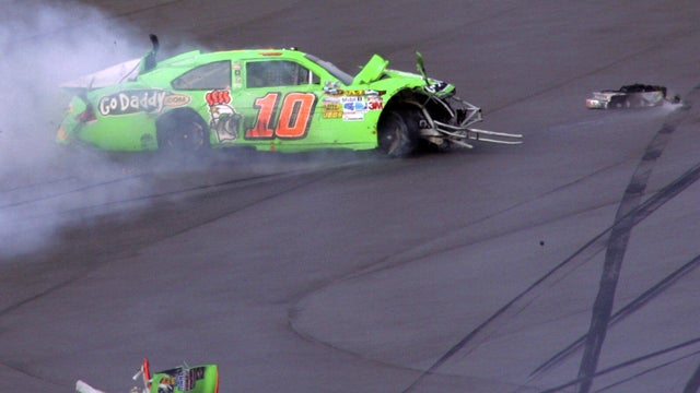 Danica Patrick car slides down the track after a crash 