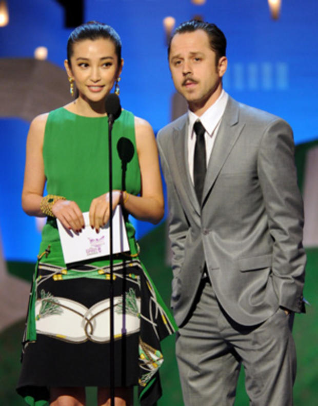 Bingbing Li, left, and Giovanni Ribisi present an award onstage at the Independent Spirit Awards 