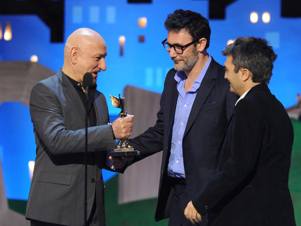 Ben Kingsley presents the best feature award to Michel Hazanavicius and Thomas Langmann for "The Artist" at the Independent Spirit Awards  