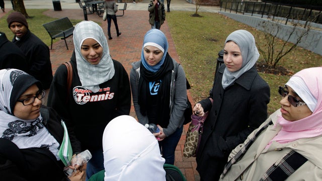 A group of Muslim students gather outside Rutgers' Paul Robeson Campus Center in Newark, N.J., Friday, Feb. 24, 2012, after the New Jersey chapter of the Council on American-Islamic Relations (CAIR-NJ), along with the Rutgers University Muslim Alumni Asso 