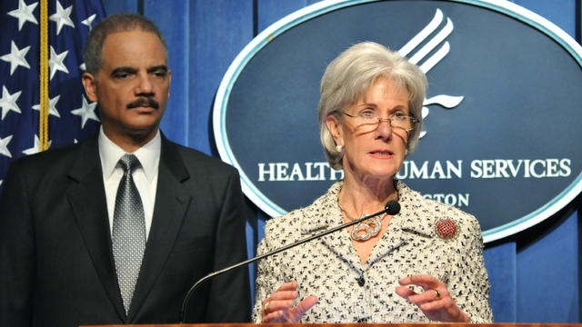 US Attorney General Eric Holder,(L) and Health and Human Services (HHS) Secretary Kathleen Sebelius announce the new Health Care Fraud and Abuse Control Program (HCFAC) on Feb. 14, 2012 in Washington, DC. 