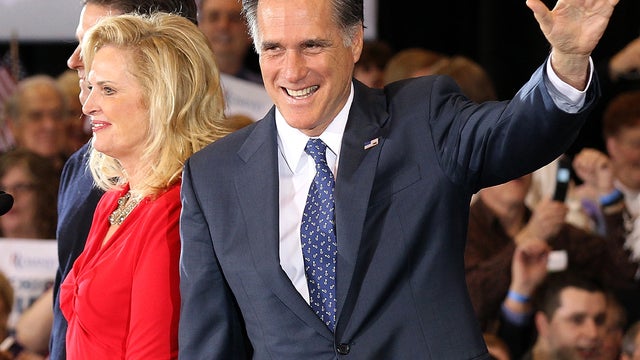 Former Massachussetts Gov. Mitt Romney waves to supporters during a primary night gathering at the Suburban Collections Showplace Feb. 28, 2012, in Novi, Mich. 
