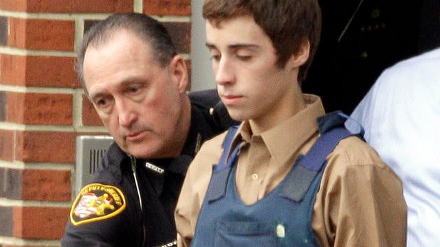 Seventeen-year-old TJ Lane is led from Juvenile Court by sheriff's deputies in Chardon, Ohio, Feb. 28, 2012, after his arraignment in the shooting of five high-school students. 