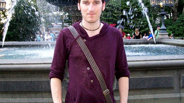 Chris McManus poses at an unknown location in this undated photo provided by his family via the British Foreign Office. 