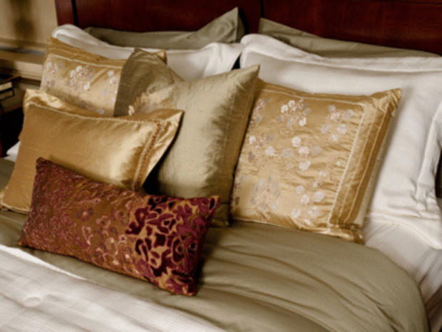 Shopping &amp; Style Bedding, Pillows on Bed 
