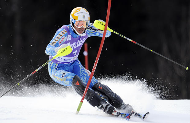 Andre Myhrer negotiates a gate during the first run of an alpine ski, men's World Cup slalom  