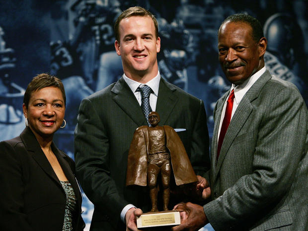Peyton Manning poses Connie Payton and Gene Upshaw 