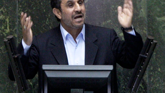 Iranian President Mahmoud Ahmadinejad answers questions in an open session of parliament in Tehran, Iran, March 14, 2012. 