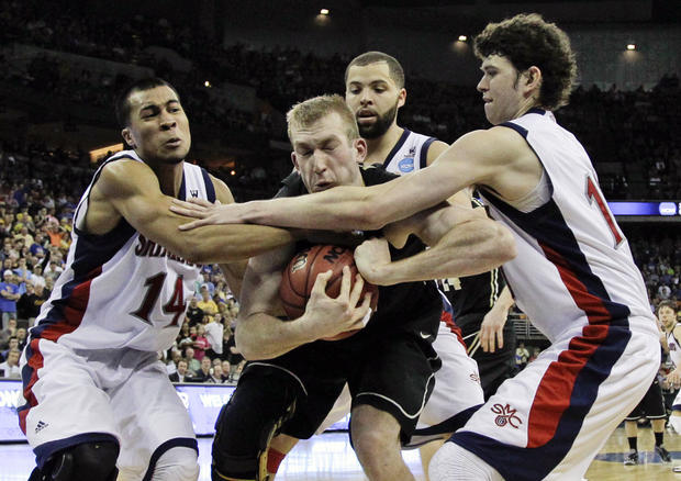 Robbie Hummel is fouled by St. Mary's Stephen Holt 