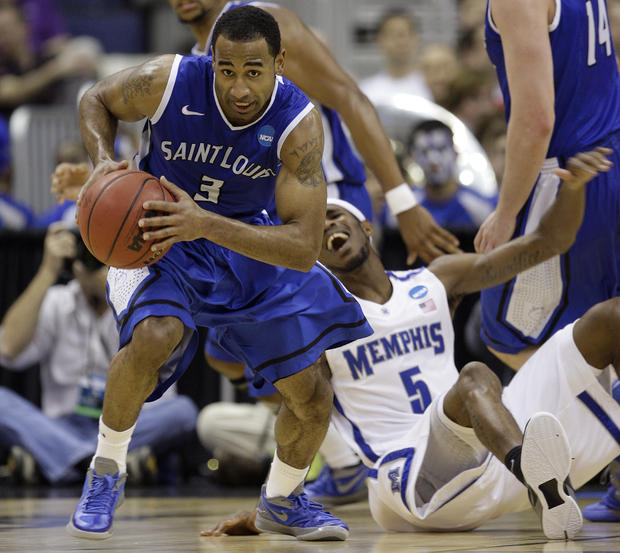 St. Louis' Kwamain Mitchell, left, steals the ball from Memphis' Will Barton 