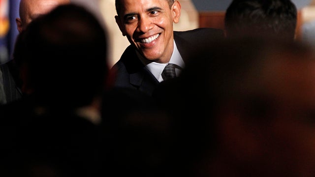 President Obama greets supporters during a fundraiser at the Palmer House Hotel in Chicago March 16, 2012. 